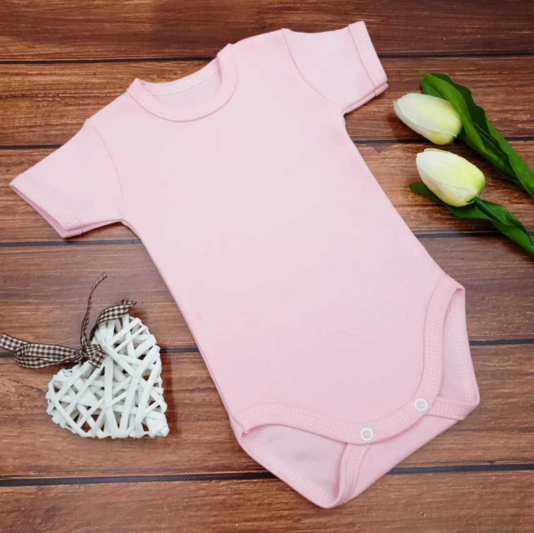 Najlepsze body niemowlęce jednokolorowe - wybierz idealny model dla maluszka